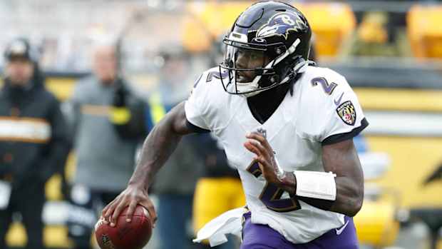 Ravens quarterback Tyler Huntley scrambles in a game vs. the Steelers.